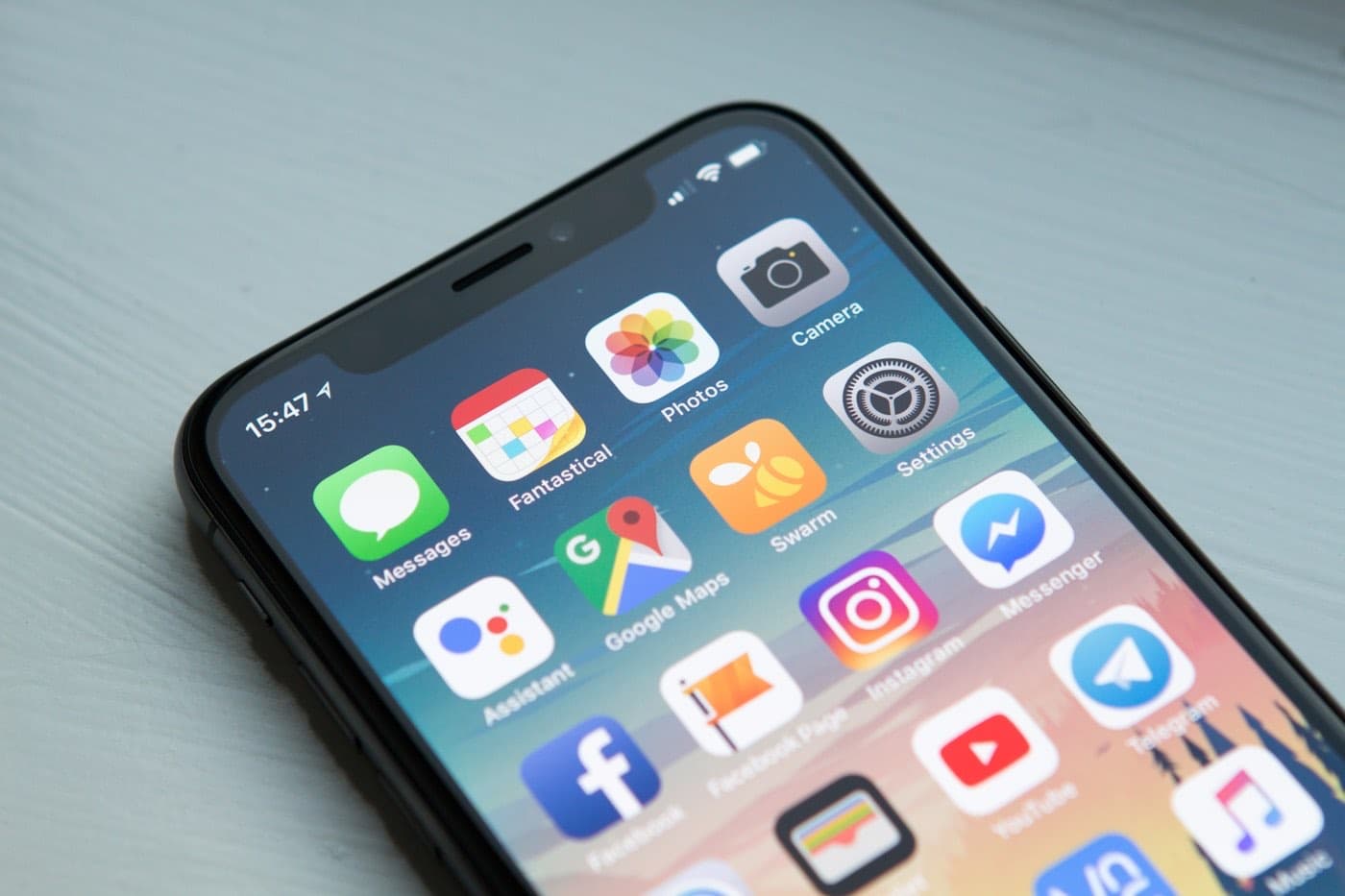 A phone home screen crowded with delivery apps